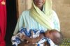 Mary Musa Ali mit ihrem Kind, das sie während der langen Flucht in ihrem Bauch trug (csi)